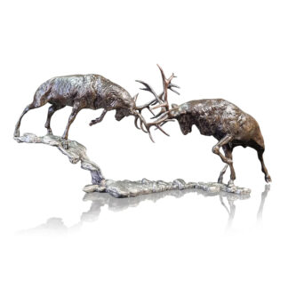 Two metal stag sculptures are depicted mid-battle, with their antlers locked together, standing on a rocky base with a reflective surface below. By Lesley Anne Derks