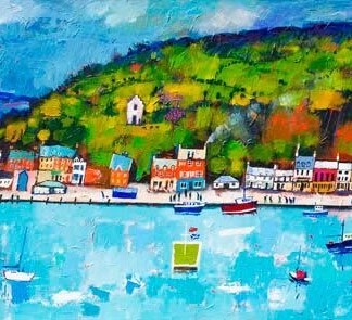 “Harbour Street, Tarbert” is a colorful painting depicting a seaside village with boats on blue waters, a green hill behind the town, and a ship sailing in the distance under a cloudy sky.