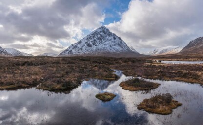 Winter landscape image of River Etive iconic snowcapped Stob Dearg Buachaille Etive Mor mountain