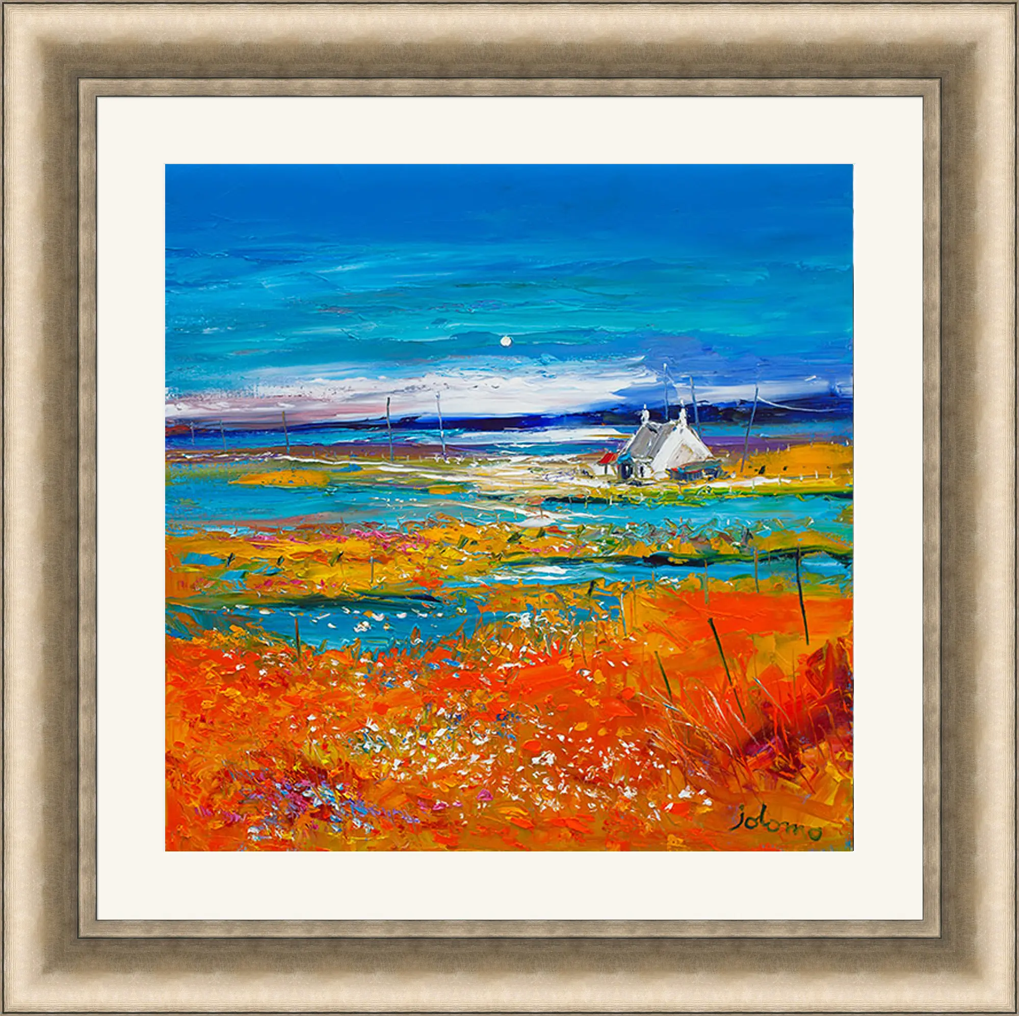 Colourful landscape painting with orange fields, a blue sky, and two small white houses by water. Impressionist style with bold brushstrokes. Framed with a beige and gold border.