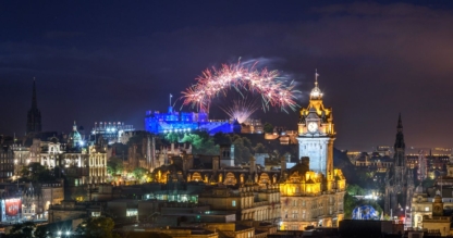 Edinburgh Castle illuminated by fireworks during the Edinburgh Fringe and International Festival.