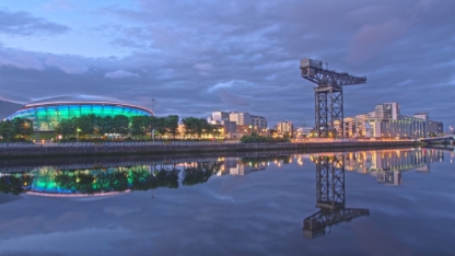 Photograph of the harbour district of Glasgow in Scotland by the River Clyde, featuring the Finnieston Crane